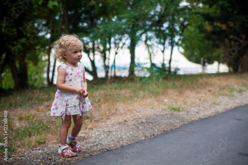 Little girl walking in the park © al1188