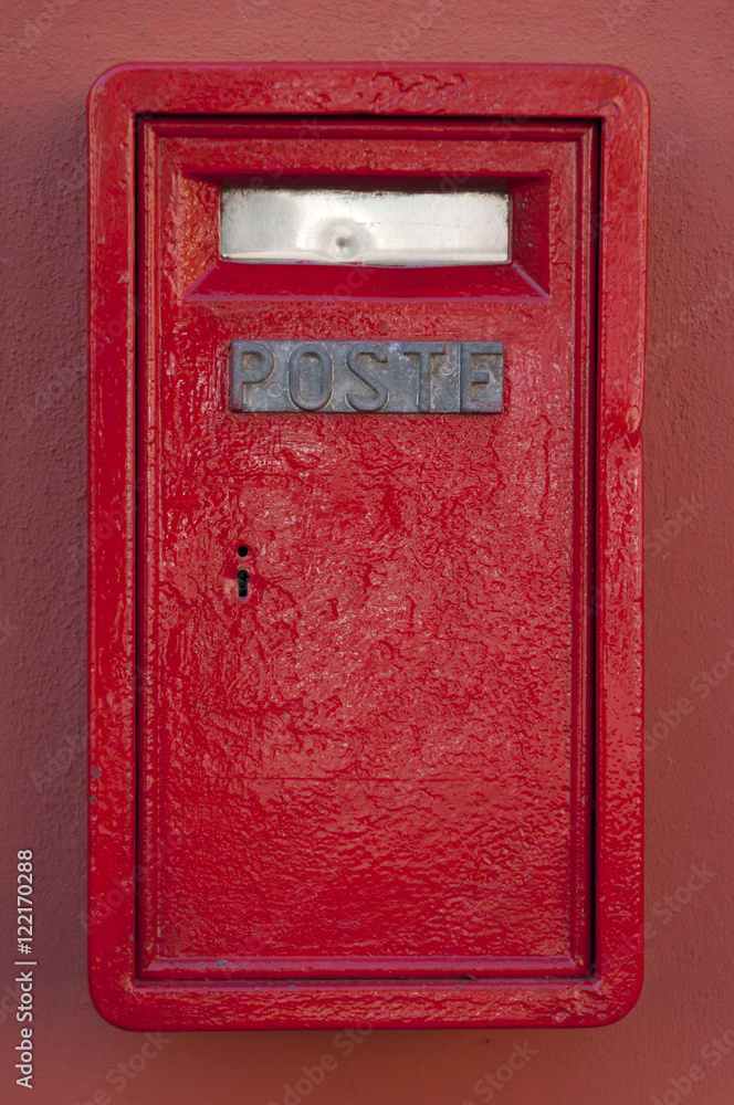 wall red mailbox in Italy, the city of Edolo wall red mailbox in Italy, the city of Edolo