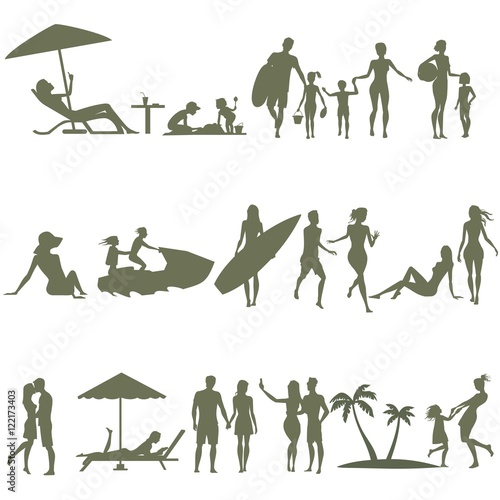 silhouettes of people on the beach