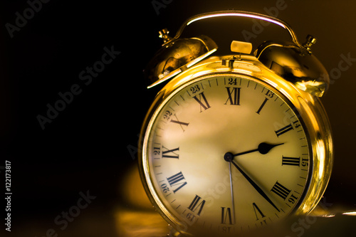 clock. gold watch at night