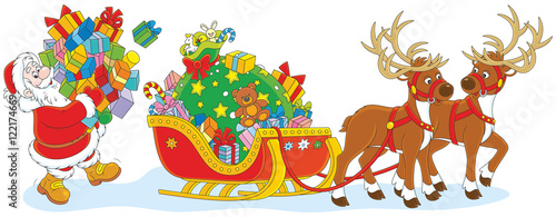 Santa loading gifts in his sleigh