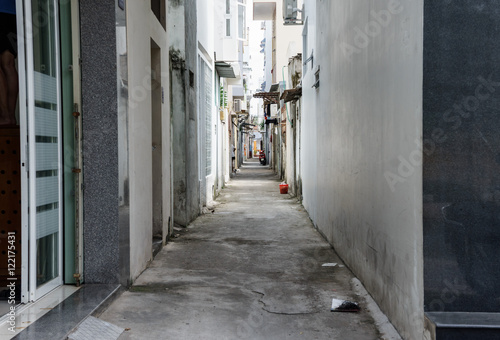 Vietnamese narrow street. homes are located close to each other. Nha Trang