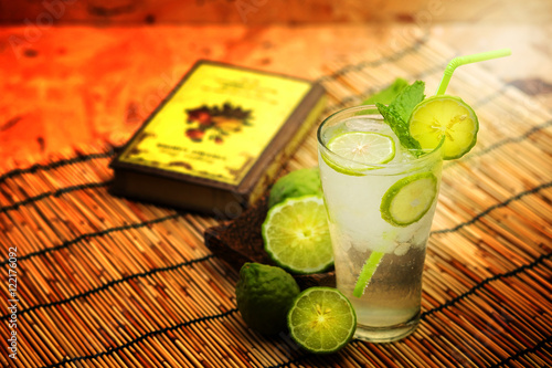 Kaffir lime, Bergamot soda Cool drink , Herb for Treatment of Acid Reflux, with Earth tone background