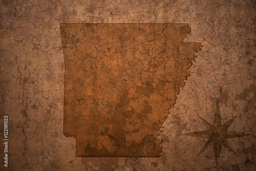 arkansas state map on a old vintage crack paper background