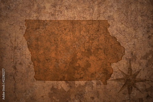 iowa state map on a old vintage crack paper background