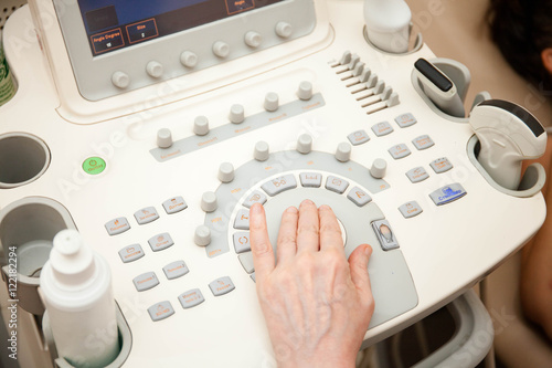 Doctor performing an ultrasound examination