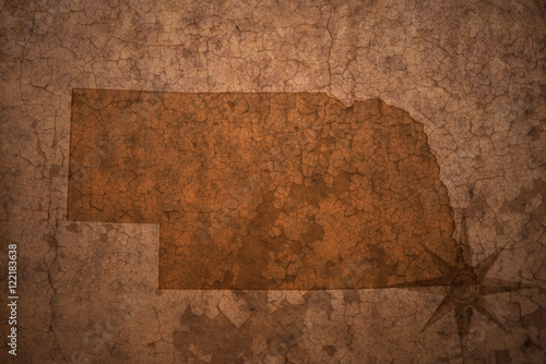 nebraska state map on a old vintage crack paper background