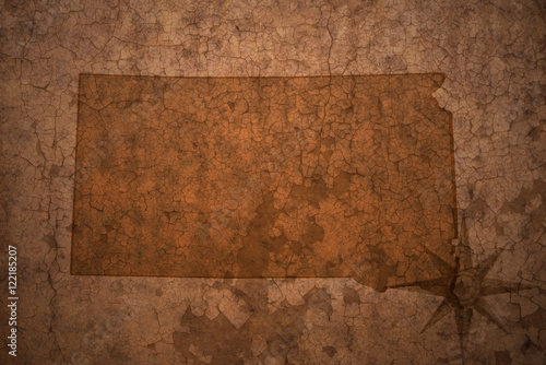 south dakota state map on a old vintage crack paper background
