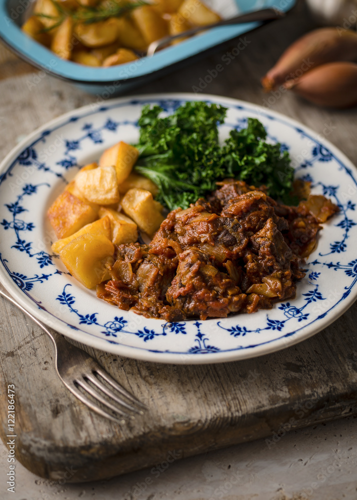Plate of Stew, Potatoes and Greens