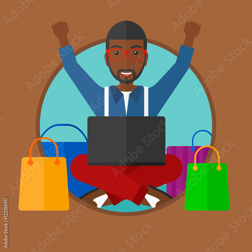 Man shopping online using his laptop.