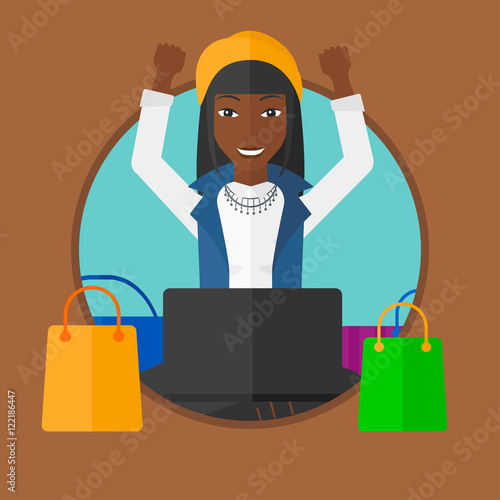 Woman shopping online using her laptop.