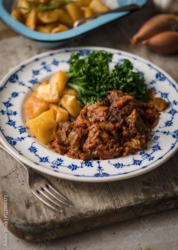 Plate of Stew, Potatoes and Greens