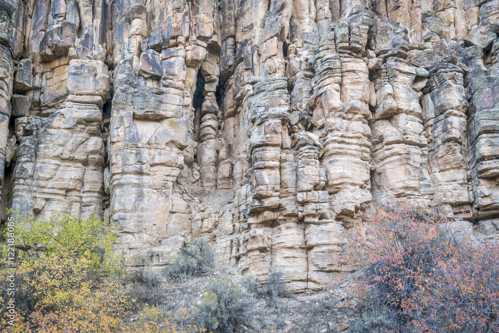 sandstone cliff with columns and pillars sandstone cliff with columns and pillars