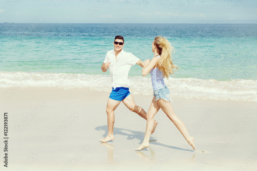 Romantic young couple on the beach