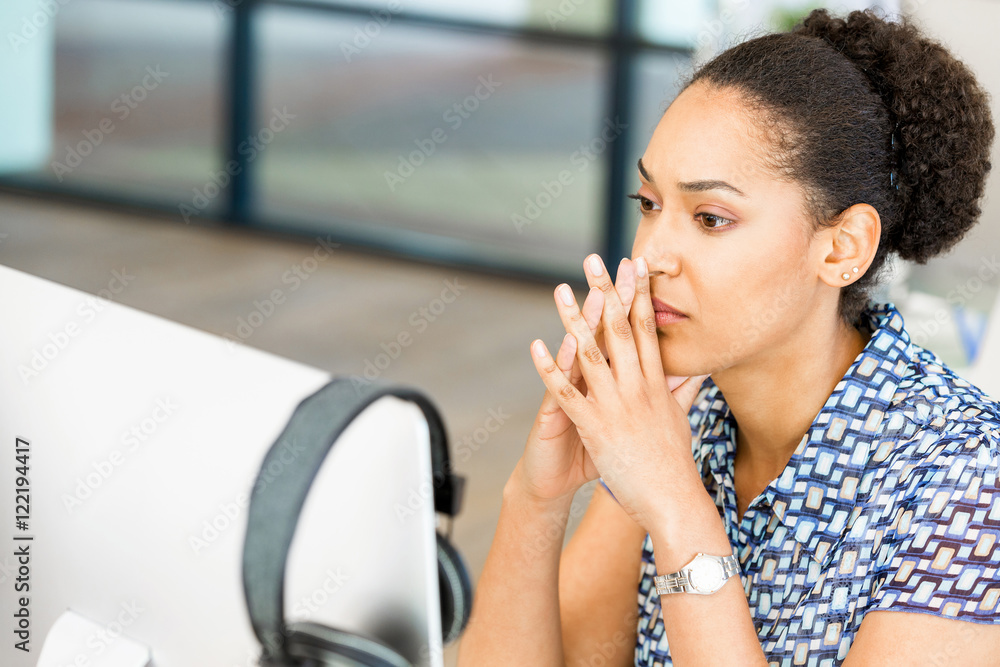 Portrait of tired afro-american office worker sitting in offfice Portrait of tired afro-american office worker sitting in offfice