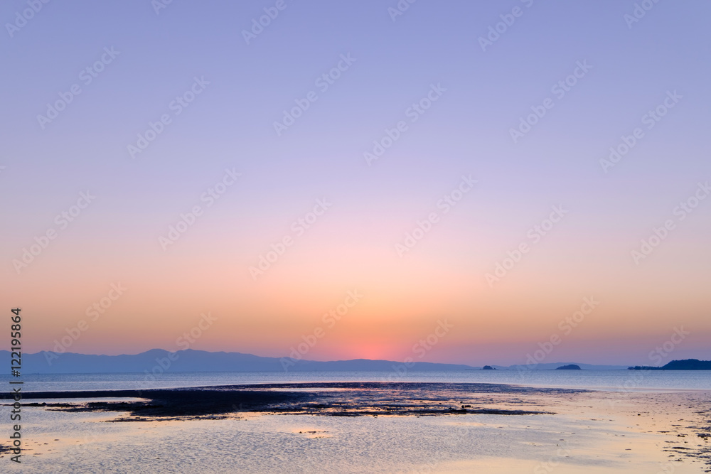 ebb tide and sunset at Bakunyai island, Satun province , Thailan