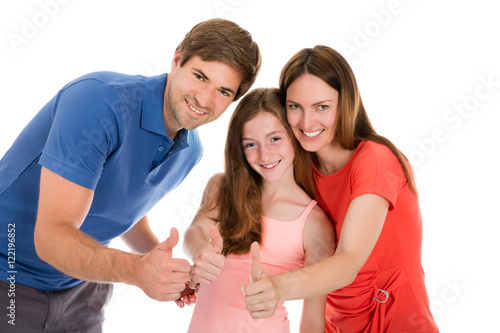 Happy Family Gesturing Thumbs Up