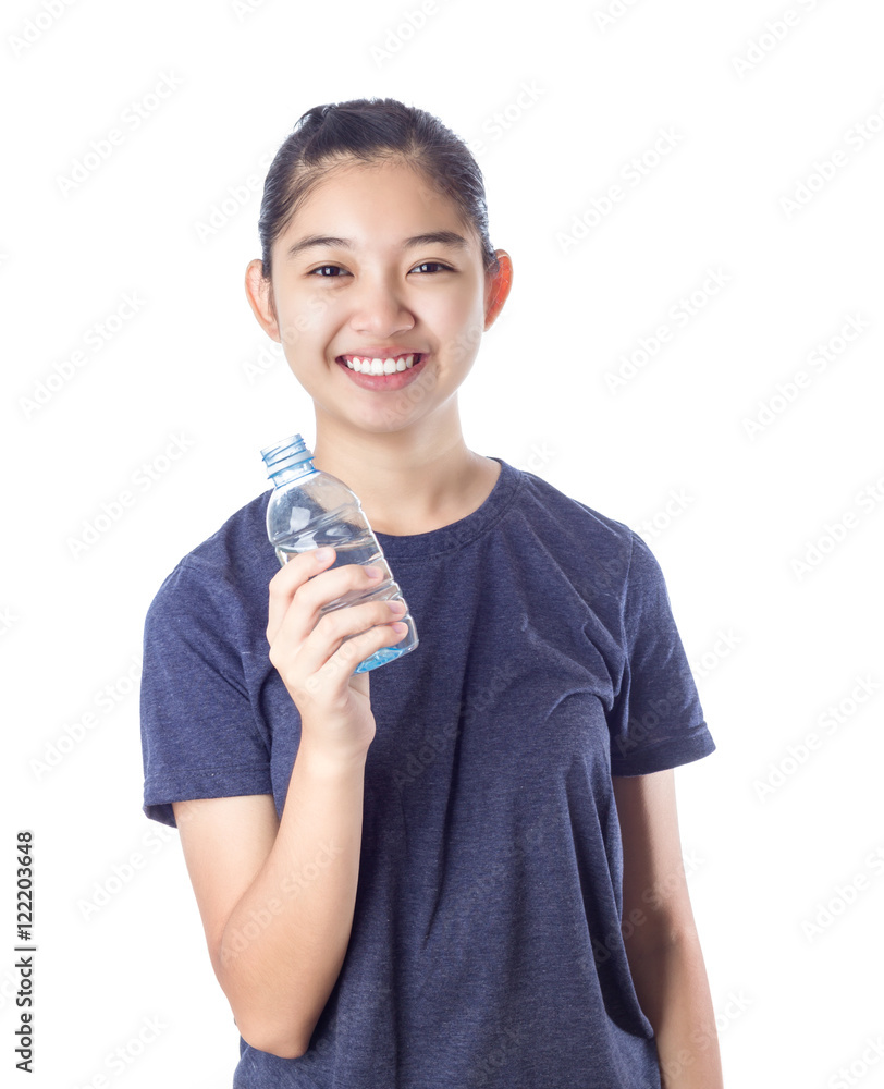 Young happy smiling girl holding a bottle of water Young happy smiling girl holding a bottle of water