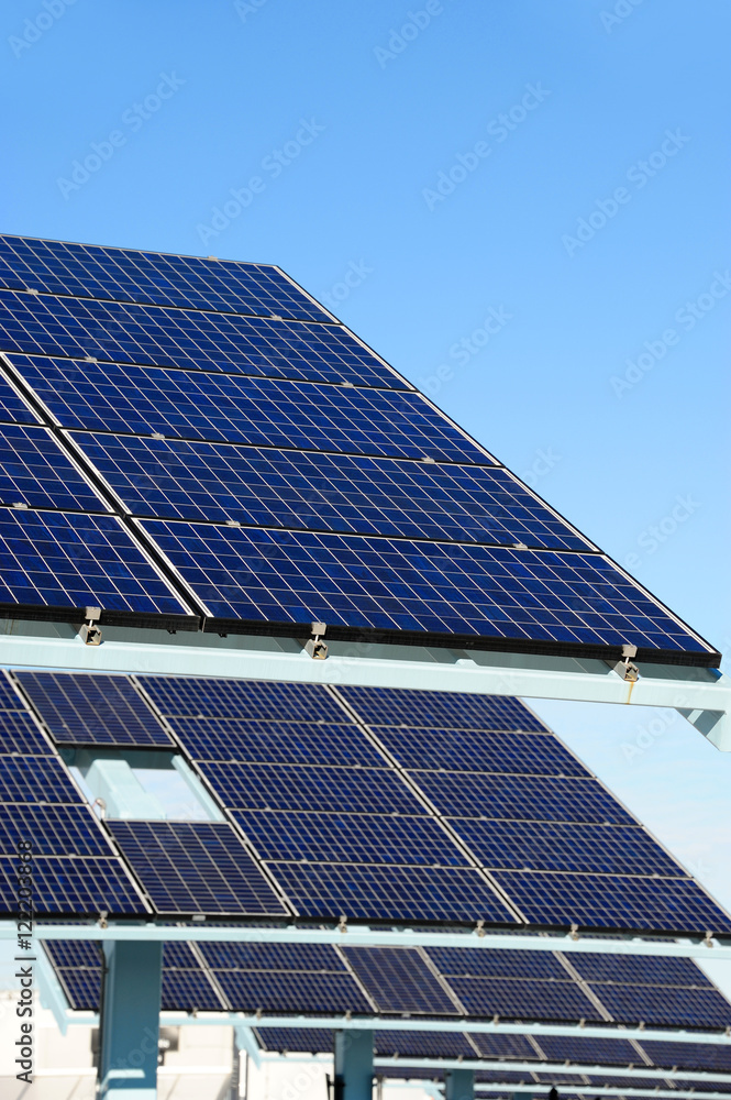 Fototapeta premium solar panels in a row in solar power station
