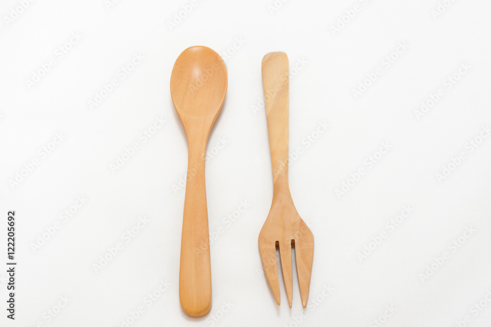 spoon and fork wood isolated on white background spoon and fork wood isolated on white background