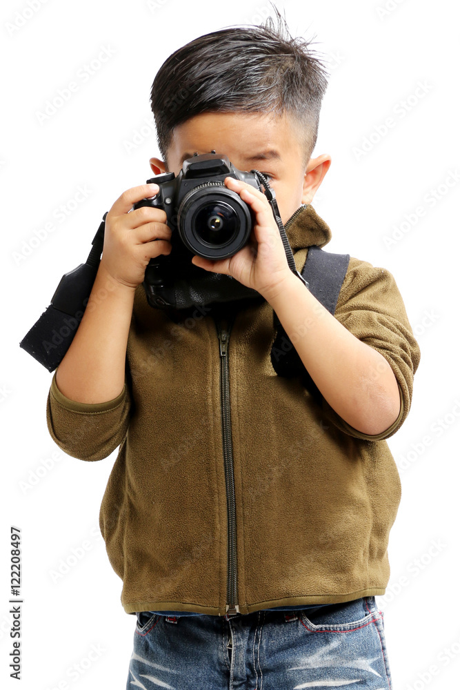 Asian boy using a camera on a white background.isolated Asian boy using a camera on a white background.isolated