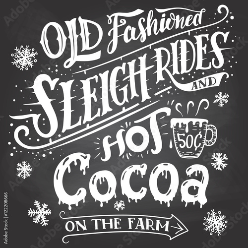 Old fashioned sleigh rides and hot cocoa on the farm. Chalkboard hand-lettering sign. Hand drawn typography with a mug of hot cocoa. Signpost on blackboard background with chalk