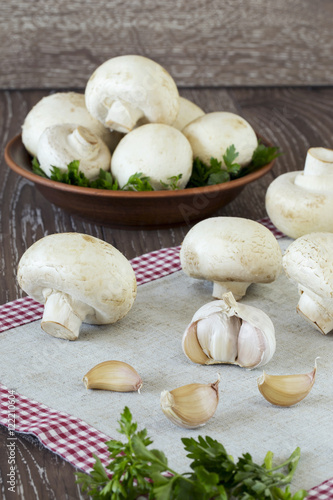 head of garlic and mushrooms