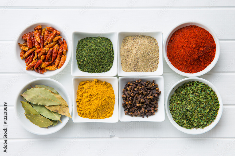 Various dried herbs and spices in bowl. Various dried herbs and spices in bowl.