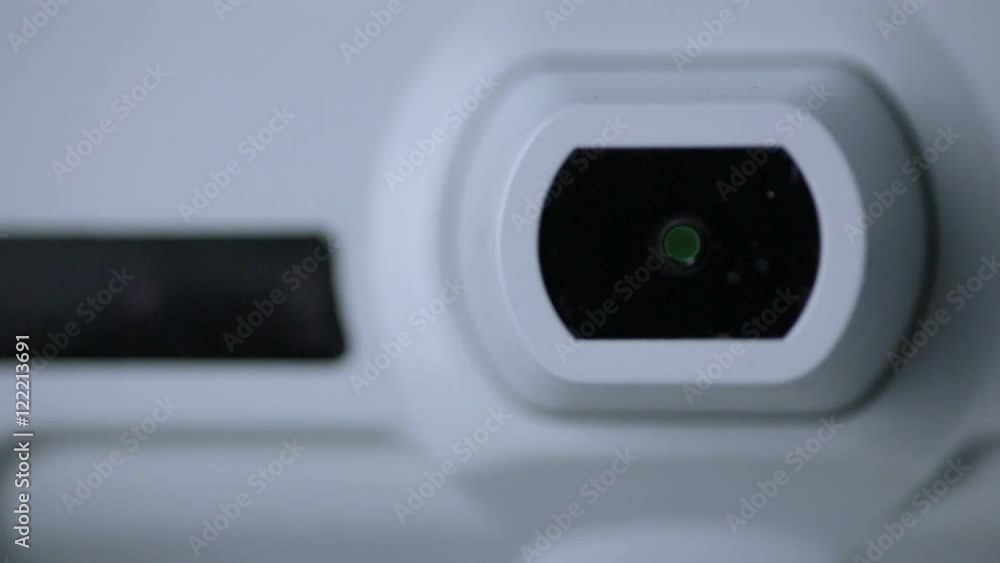 Modern automated machine examining eyeball. Eye examination test on a professional medical equipment screen. HD. Modern automated machine examining eyeball. Eye examination test on a professional medical equipment screen. HD.