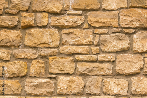 Brown wall with masonry, background