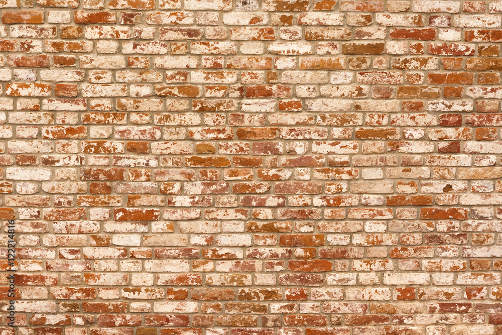 Naklejka premium Red and white brick wall, background, texture