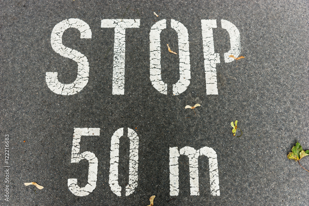 Stop 50 meters on city asphalt on floor