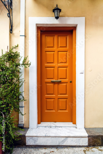 Wooden yellow front door