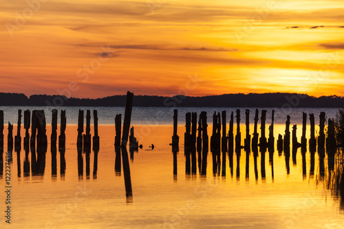 Φωτογραφία Old groyne in sunset