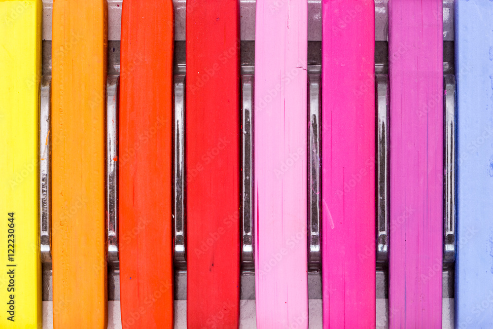 Bunch of square colorful pastel chalks in a box closeup Bunch of square colorful pastel chalks in a box closeup