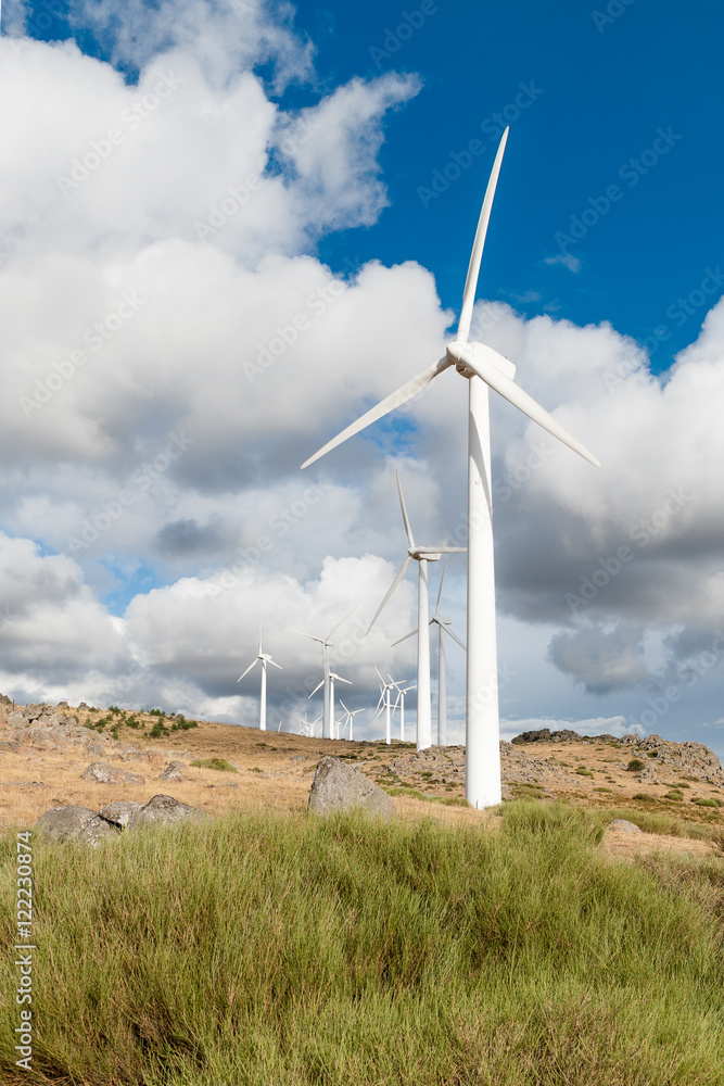 wind turbines on the mountain on cloud isolated on blue sky wind turbines on the mountain on cloud isolated on blue sky