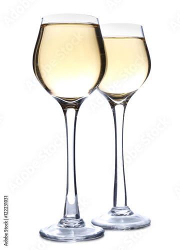 Champagne glasses and alcohol on white background 