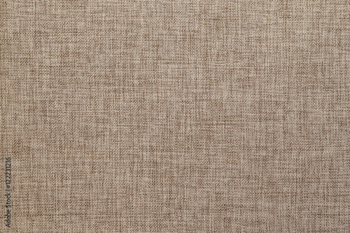 Light brown textile wallpaper with fine fabric