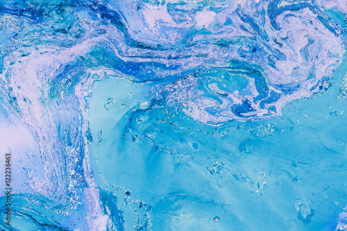 Blue marbling texture. Creative background with abstract oil painted waves handmade surface. Liquid paint. © torook