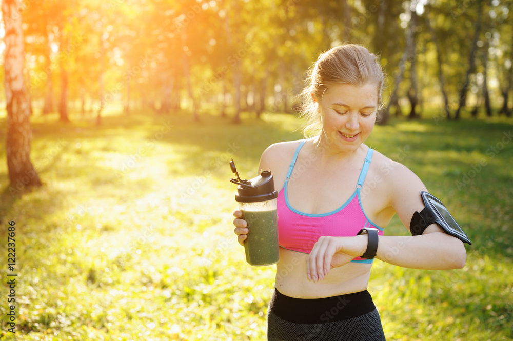 Woman after workout. Detox smoothie. Woman after workout. Detox smoothie.