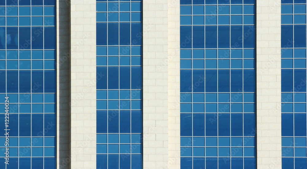 Facade of modern skyscraper office building Facade of modern skyscraper office building