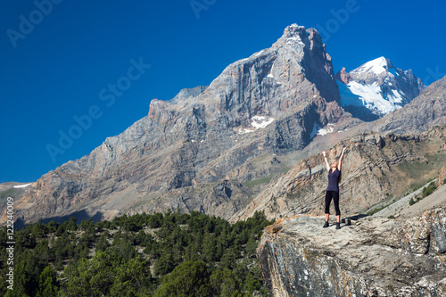 Young woman enjoying warm sun at morning