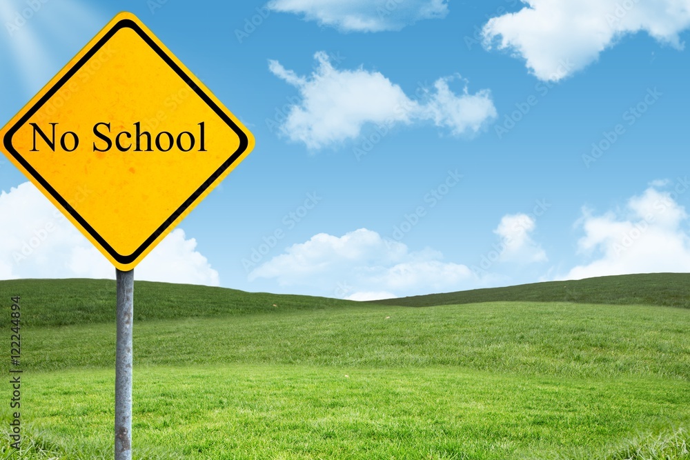 No school sign with green field and blue sky