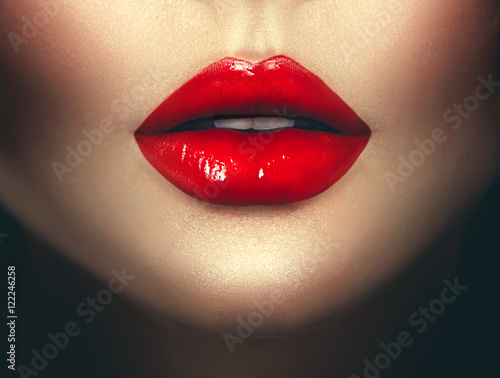 Sexy woman lips with red lipstick. Fashion glamour art design photo