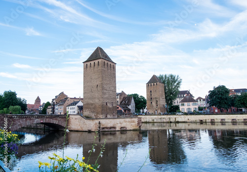 Les ponts couverts de Strasbourg, two out of three towers. View from Barrage Vauban in Alsace, France at evening day of clear blue sky.