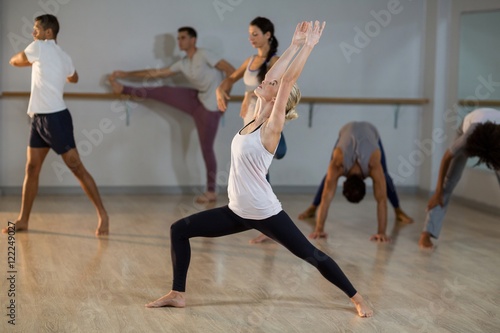 Woman performing stretching exercise