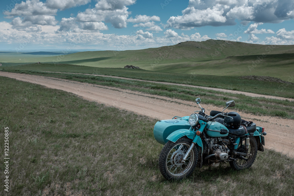 Old russian sidecar on a trail in Mongolia, Asia