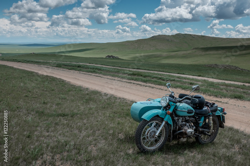 Old russian sidecar on a trail in Mongolia  Asia