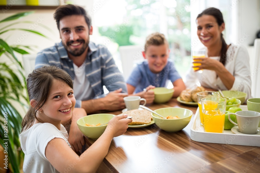 Portrait of family having breakfast Portrait of family having breakfast