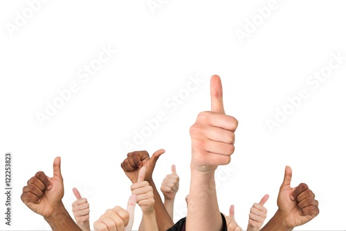 фотографія Multi-ethnic hands thump up